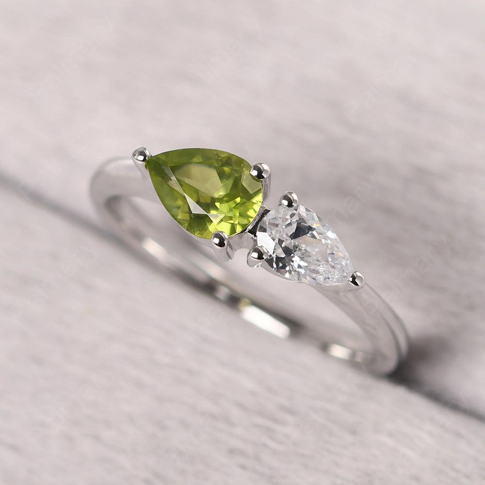 East West Pear Shaped Cubic Zirconia And Peridot Two Stone Ring - Palmary