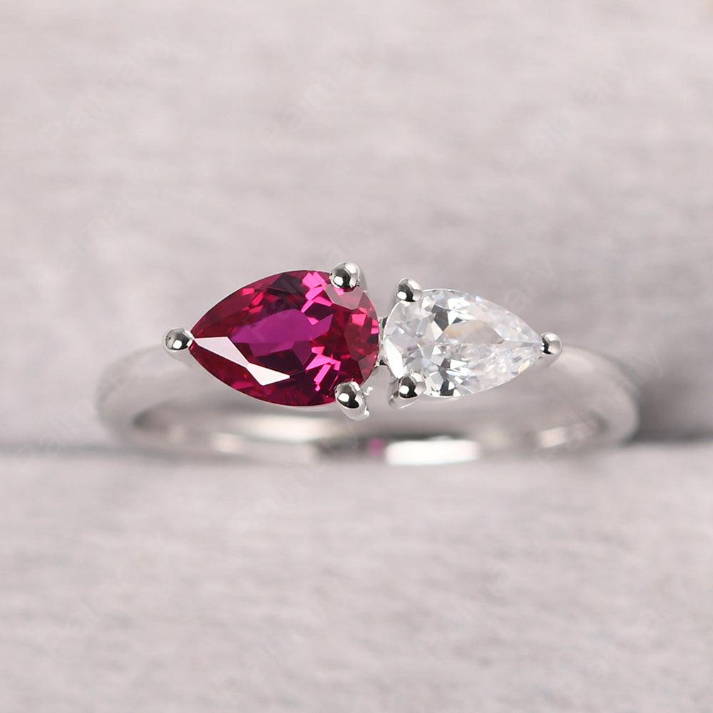 East West Pear Shaped Cubic Zirconia And Ruby Two Stone Ring - Palmary