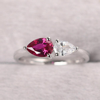 East West Pear Shaped Cubic Zirconia And Ruby Two Stone Ring - Palmary