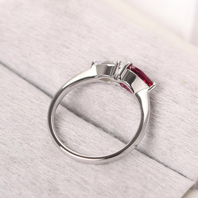 East West Pear Shaped Cubic Zirconia And Ruby Two Stone Ring - Palmary