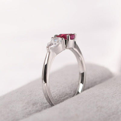 East West Pear Shaped Cubic Zirconia And Ruby Two Stone Ring - Palmary