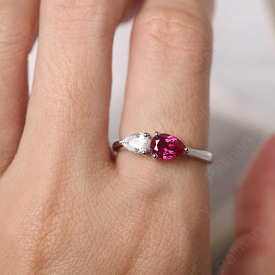 East West Pear Shaped Cubic Zirconia And Ruby Two Stone Ring - Palmary