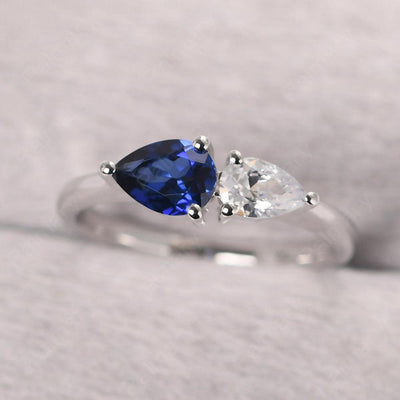 East West Pear Shaped Cubic Zirconia And Sapphire Two Stone Ring - Palmary