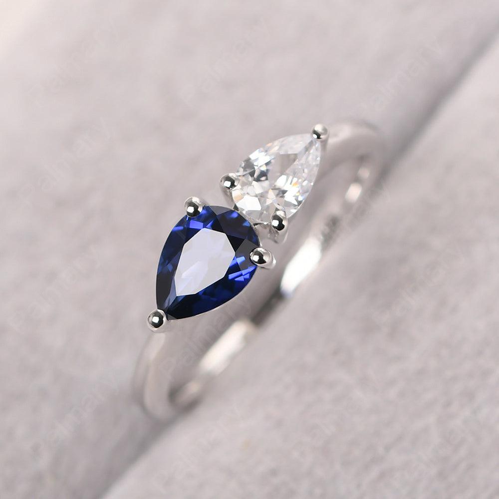 East West Pear Shaped Cubic Zirconia And Sapphire Two Stone Ring - Palmary
