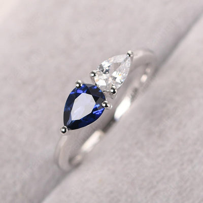 East West Pear Shaped Cubic Zirconia And Sapphire Two Stone Ring - Palmary