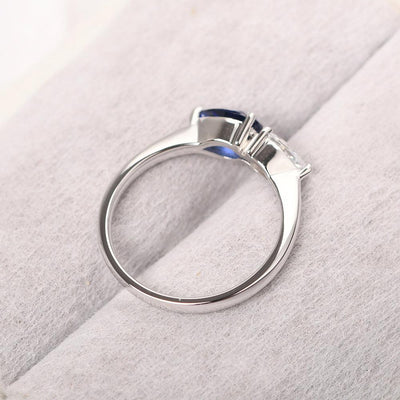 East West Pear Shaped Cubic Zirconia And Sapphire Two Stone Ring - Palmary