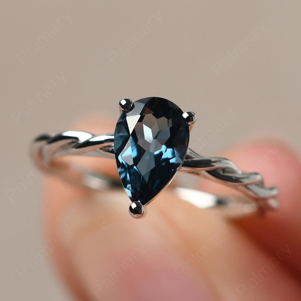 Twist Pear Shaped London Blue Topaz Solitaire Ring - Palmary