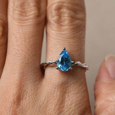 Twist Pear Shaped Swiss Blue Topaz Solitaire Ring - Palmary