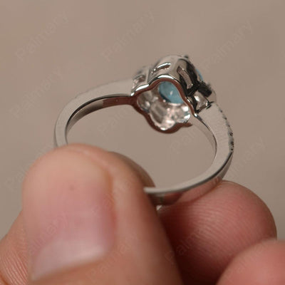 Round Cut Classics Swiss Blue Topaz Halo Rings - Palmary