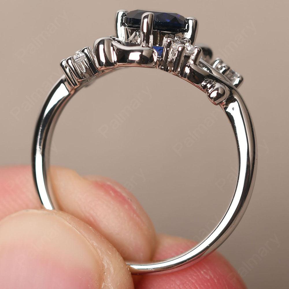 Round Cut Sapphire Ring - Palmary