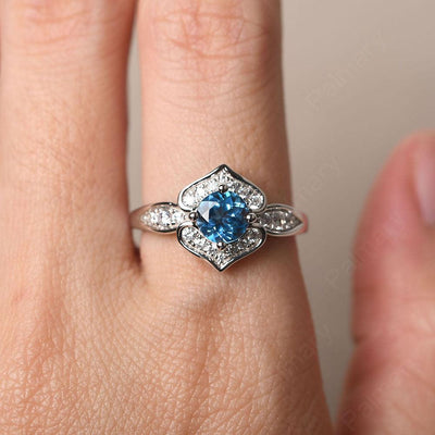 Brilliant Swiss Blue Topaz Lotus Ring - Palmary