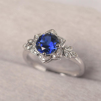 Dainty Round Cut Sapphire Wedding Rings - Palmary
