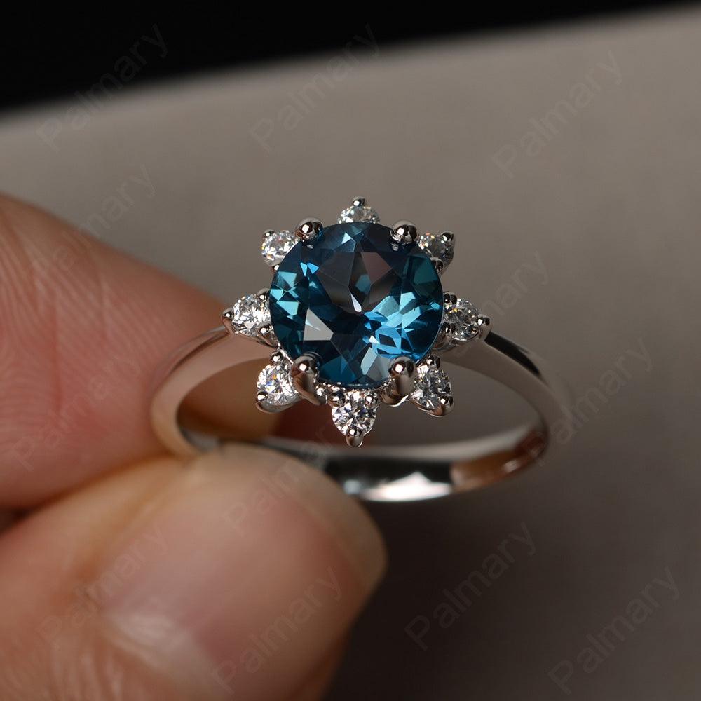 Round Cut London Blue Topaz Halo Rings - Palmary