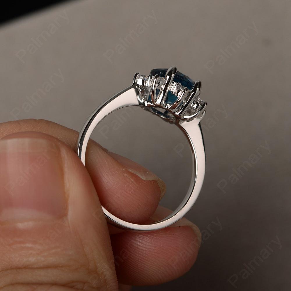 Round Cut London Blue Topaz Halo Rings - Palmary