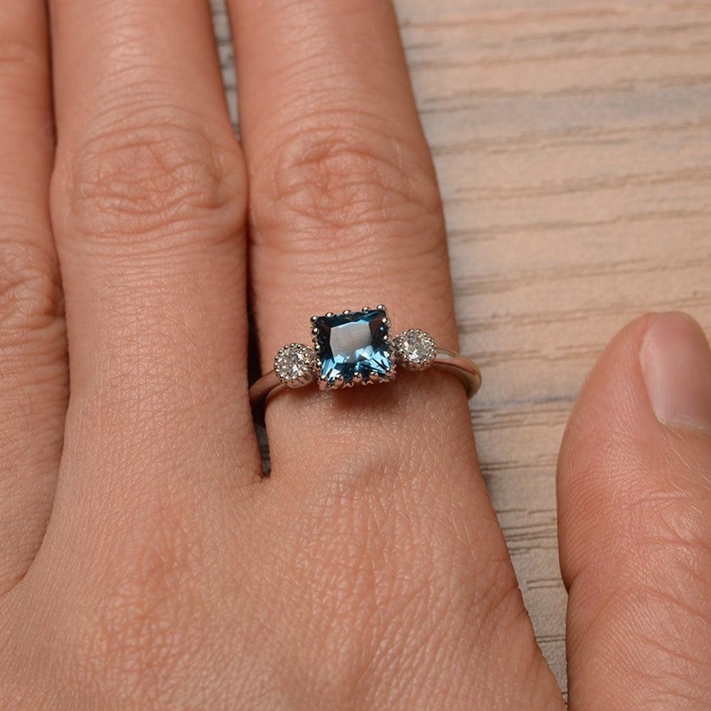 Three Stone London Blue Topaz Engagement Rings - Palmary