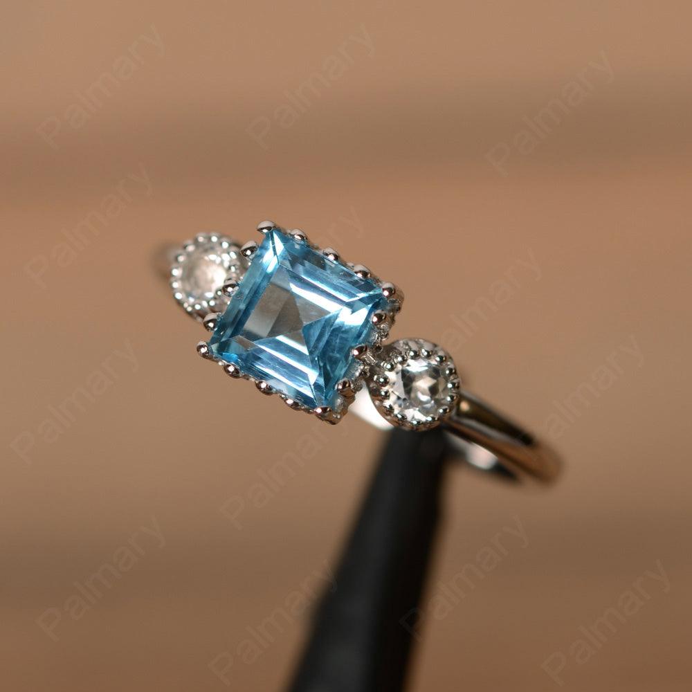 Three Stone Swiss Blue Topaz Engagement Rings - Palmary