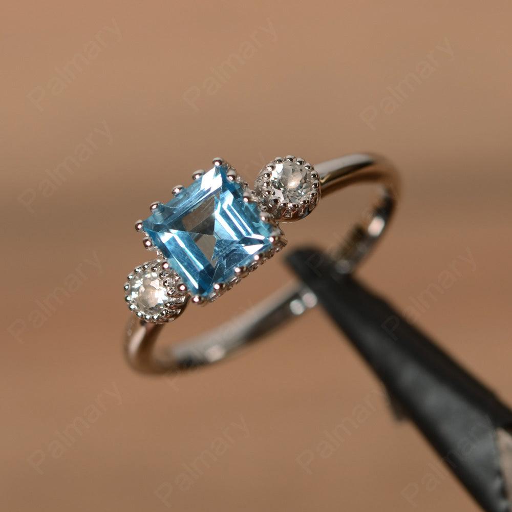 Three Stone Swiss Blue Topaz Engagement Rings - Palmary