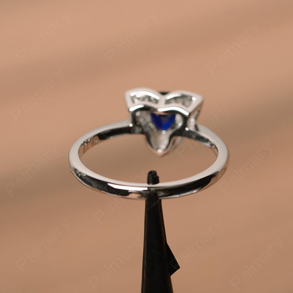 Trillion Cut Flower Sapphire Rings - Palmary